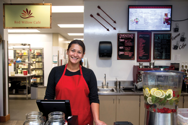 Native cafe owner in her business