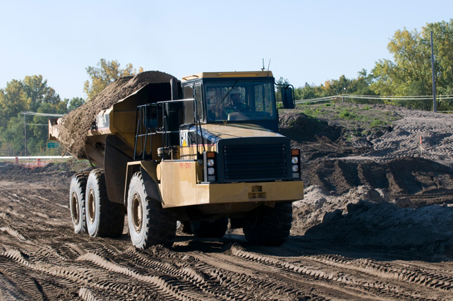 A truck carries a load of sand to a Minnesota worksite