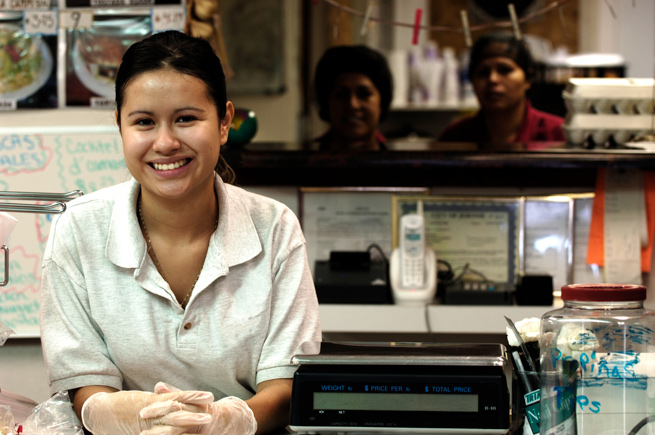 Latinx woman at a cafe counter in Jerome, Oregon