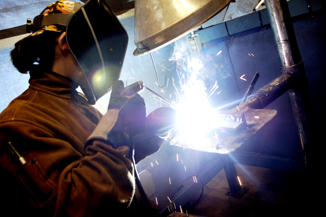 Man welding in Renton, Washington