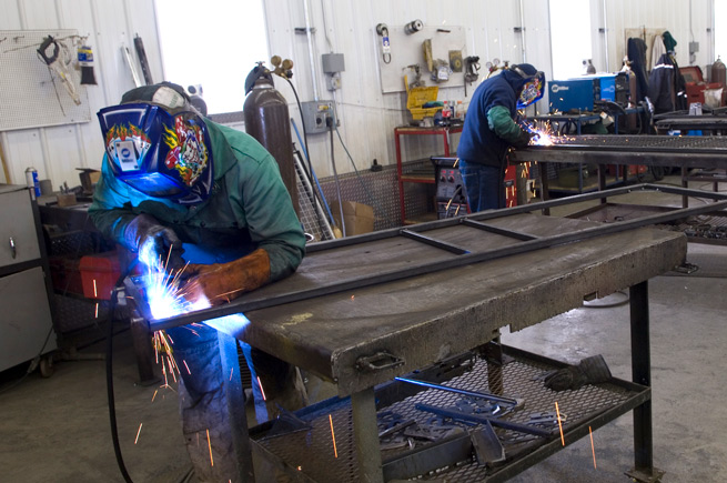 Men welding in Renton, Washington