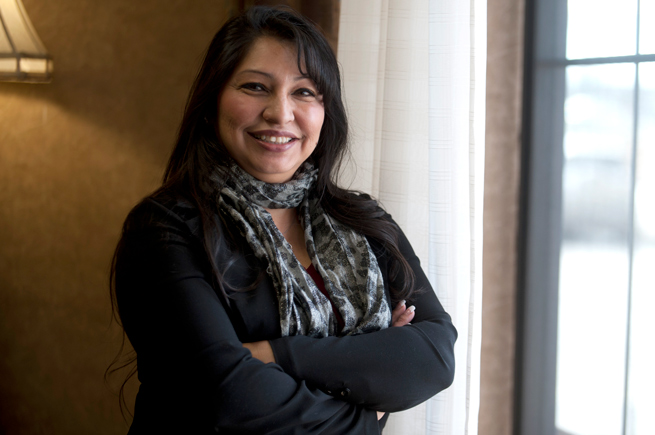 Native woman in her home