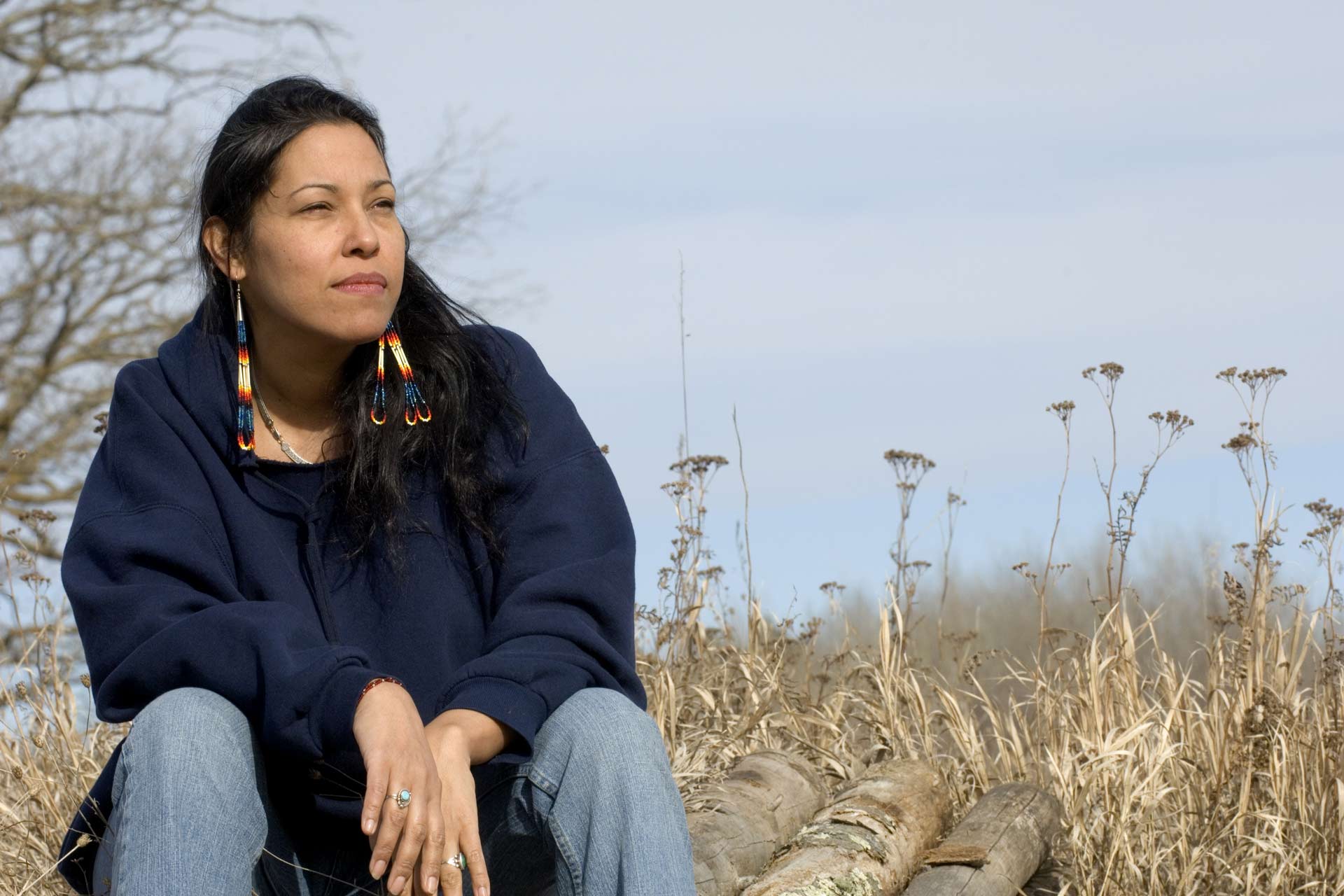 Native woman in a prairie setting